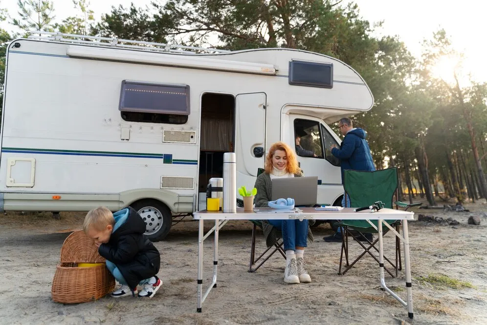full-shot-nomad-family-with-campervan